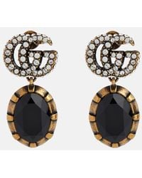 Gucci - Ohrringe mit Doppel G und schwarzen Kristallen - Lyst