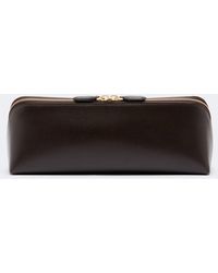 Alaïa - Delta Small Leather Clutch - Lyst