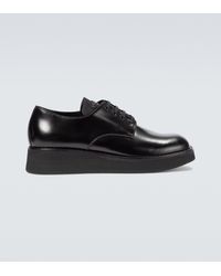 Prada Zapatos derby con plataforma - Negro