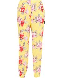 Palm Angels Pantalones plisados con estampado floral - Multicolor