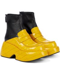 Mujer Loewe Botín tipo mocasín en piel de ternera con tachuelas Negro |  Botas y botines ⋆ MuthaFunk Company