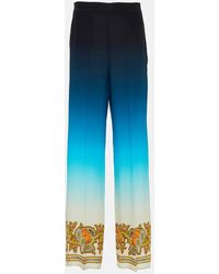 Etro - Pantalones anchos de seda estampados - Lyst