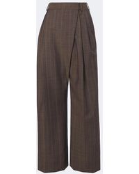 Ganni - Striped Pleated Wool Wide-Leg Pants - Lyst