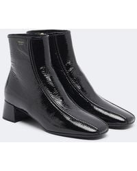 Prada - Patent Leather Ankle Boots - Lyst