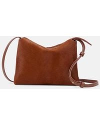 KHAITE - Lina Medium Calf Hair Crossbody Bag - Lyst