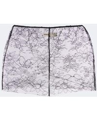 KHAITE - Tilly Sheer Lace Shorts - Lyst