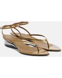 Alaïa - Invisible Patent Leather Wedge Thong Sandals - Lyst