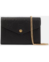 Gucci - GG Debossed Leather Wallet On Chain - Lyst