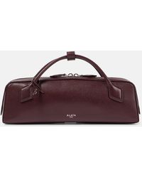 Alaïa - Clutch Le Teckel Aus Leder - Lyst