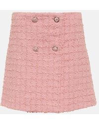 Versace - Minigonna in tweed di misto lana boucle - Lyst