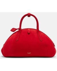 Alaïa - Purse Small Suede Top-Handle Bag - Lyst