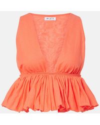 Alaïa - Peplum Striped Cotton And Linen Top - Lyst