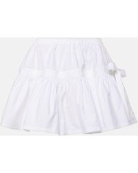 Alaïa - Bow-detail Ruffled Miniskirt - Lyst