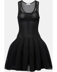 Alaïa - Short Dresses - Lyst