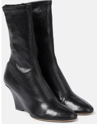 KHAITE - Apollo Wedge Leather Ankle Boots - Lyst