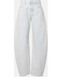 Alaïa - Low-Rise Barrel-Leg Jeans - Lyst