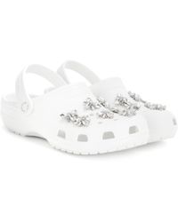 white crocs with flowers