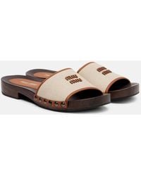 Miu Miu - Logo Slides - Lyst