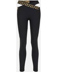 Versace - Greca Cutout leggings - Lyst