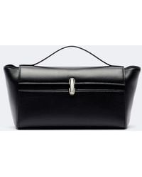 SAVETTE - Symmetry Trapeze Leather Clutch - Lyst
