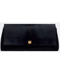 KHAITE - Audrey Calf Hair Clutch - Lyst