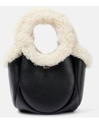 Coperni - Bucket-Bag Swipe Mini Aus Leder Mit Faux Fur - Lyst