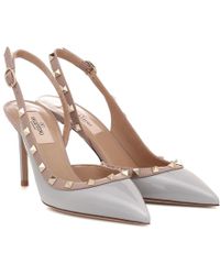 Valentino Pumps slingback Rockstud in vernice - Multicolore