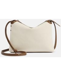 KHAITE - Schultertasche Lina Aus Canvas Mit Leder - Lyst