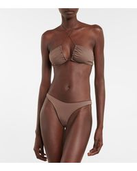 1% di sconto Slip Bikini In Techno Riciclato di Tropic of C in Nero Donna Abbigliamento da Abbigliamento da spiaggia da Bikini e costumi interi 