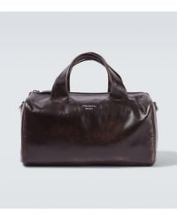 Prada - Small Leather Duffel Bag - Lyst