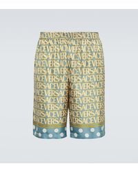 Versace - Stylish Silk Bermuda Shorts With All-Over Logo - Lyst