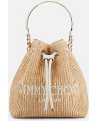 Jimmy Choo - Bucket-Bag Bon Bon Small aus Raffiabast - Lyst