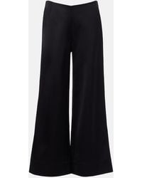 TOTEME - Satin Flared Pants - Lyst