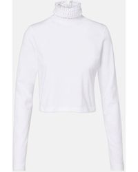 Alaïa - Cropped Turtleneck Cotton Jersey Top - Lyst