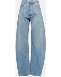 Alaïa - High-Rise Barrel-Leg Jeans - Lyst