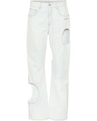 white cut out jeans