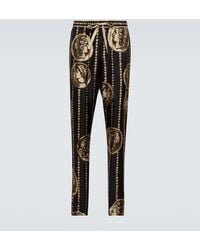 Dolce & Gabbana - Pantaloni regular in seta con stampa - Lyst