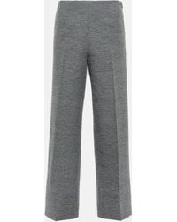 Totême - Pantalon ample en laine melangee - Lyst