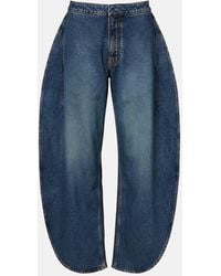 Alaïa - Mid-Rise Barrel-Leg Jeans - Lyst