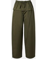 Alaïa - Peplum Cotton Tapered Pants - Lyst