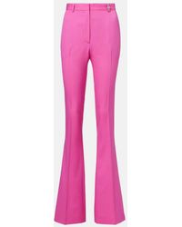 Versace - Embellished High-Rise Wool Flared Pants - Lyst