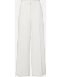 KHAITE - Bacall Mid-Rise Wide-Leg Pants - Lyst