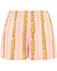 Versace Shorts de algodon estampados - Naranja
