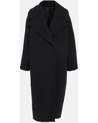 Alaïa - Cappotto Cocoon in lana - Lyst