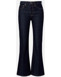 KHAITE - Clara Flared Jeans - Lyst