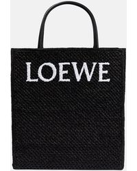 Loewe - Tote de rafia con ribetes de piel y logo - Lyst