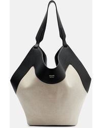 KHAITE - Lotus Medium Leather-Trimmed Canvas Tote Bag - Lyst