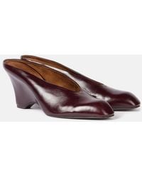 KHAITE - Colt 75 Leather Wedge Mules - Lyst