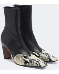 KHAITE - Nevada Leather Ankle Boots - Lyst