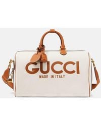 Gucci - Borsa da viaggio Large in canvas con logo - Lyst